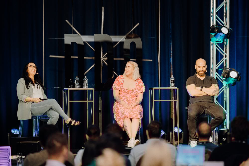 DDO2023 Rachel Crockett, Kimberley Harcombe and Stanley Henry on stage