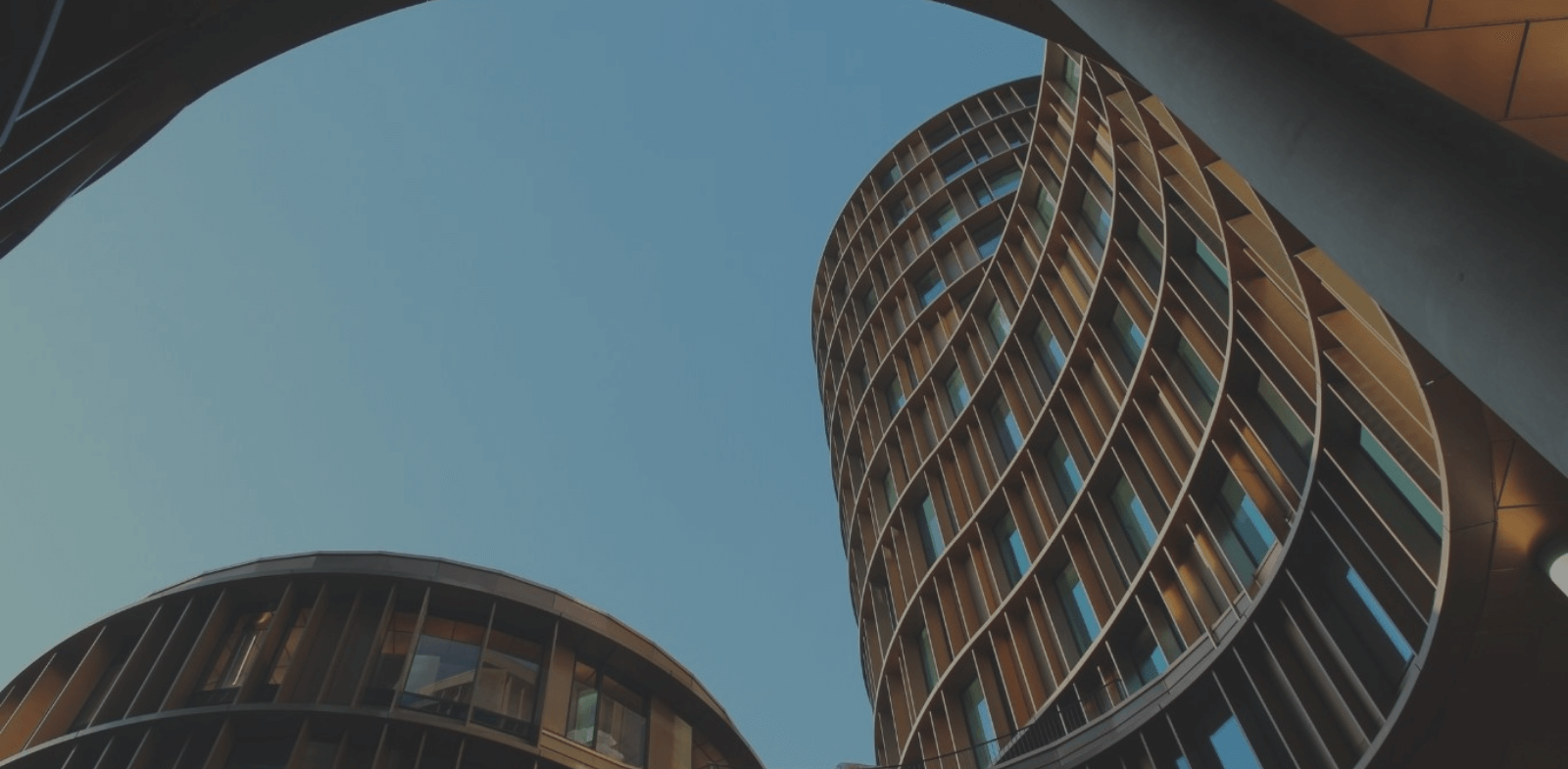 low angle shot of modern curved building