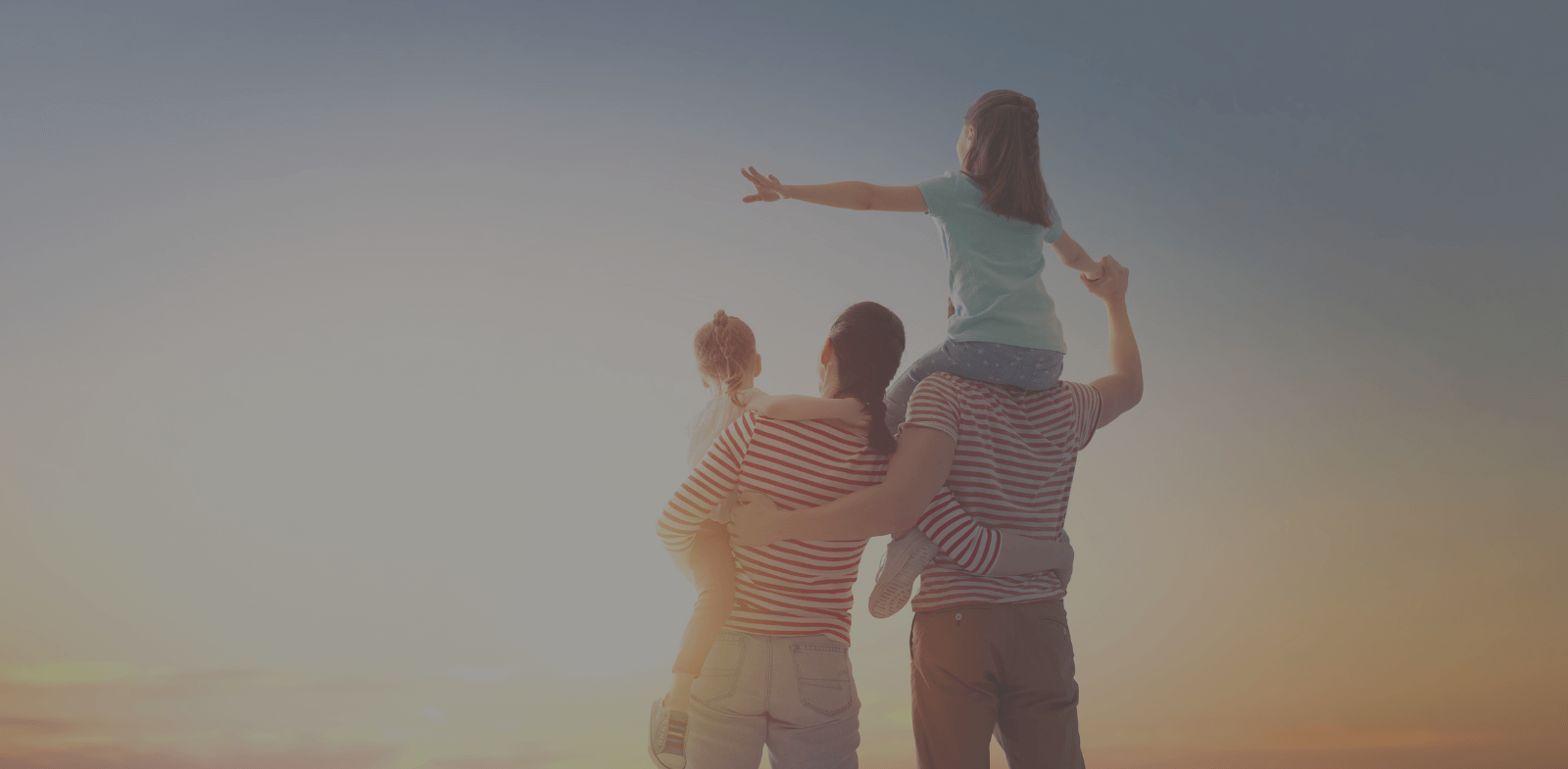 stock photo of family at sunset
